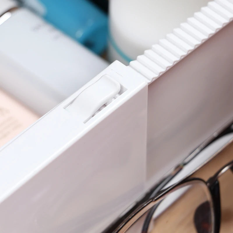 Séparateur de tiroir extensible