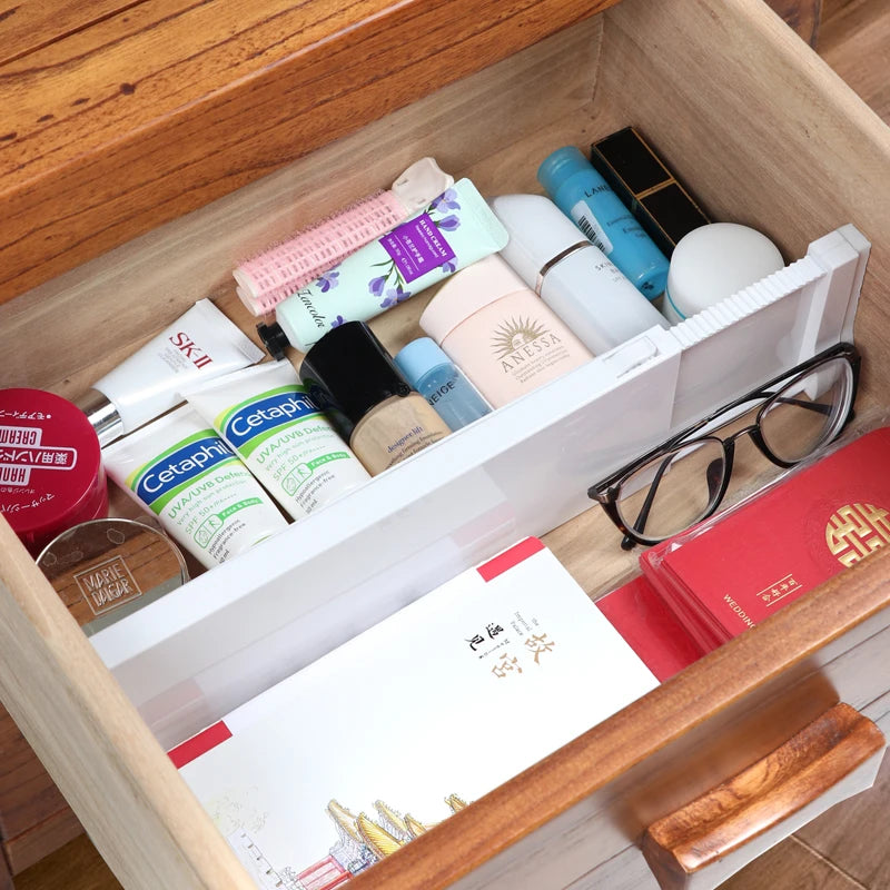 Séparateur de tiroir extensible